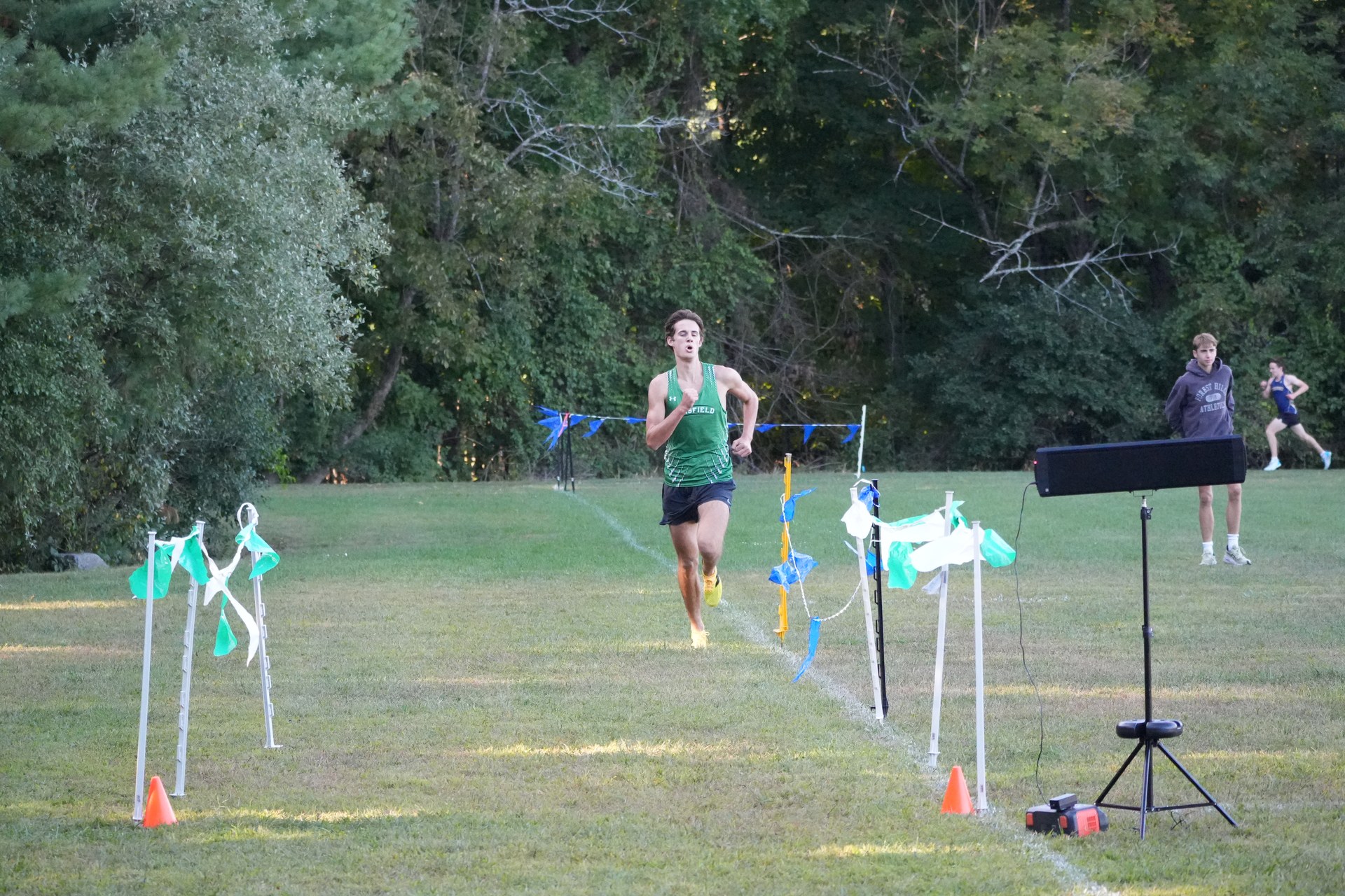 Down the marked lane toward the finish.