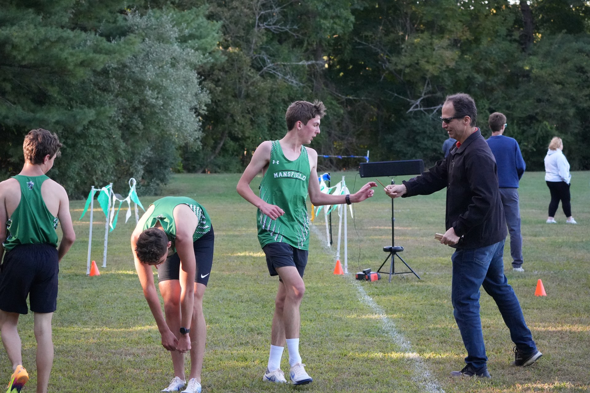 Mansfield teammates arrive at the finish.