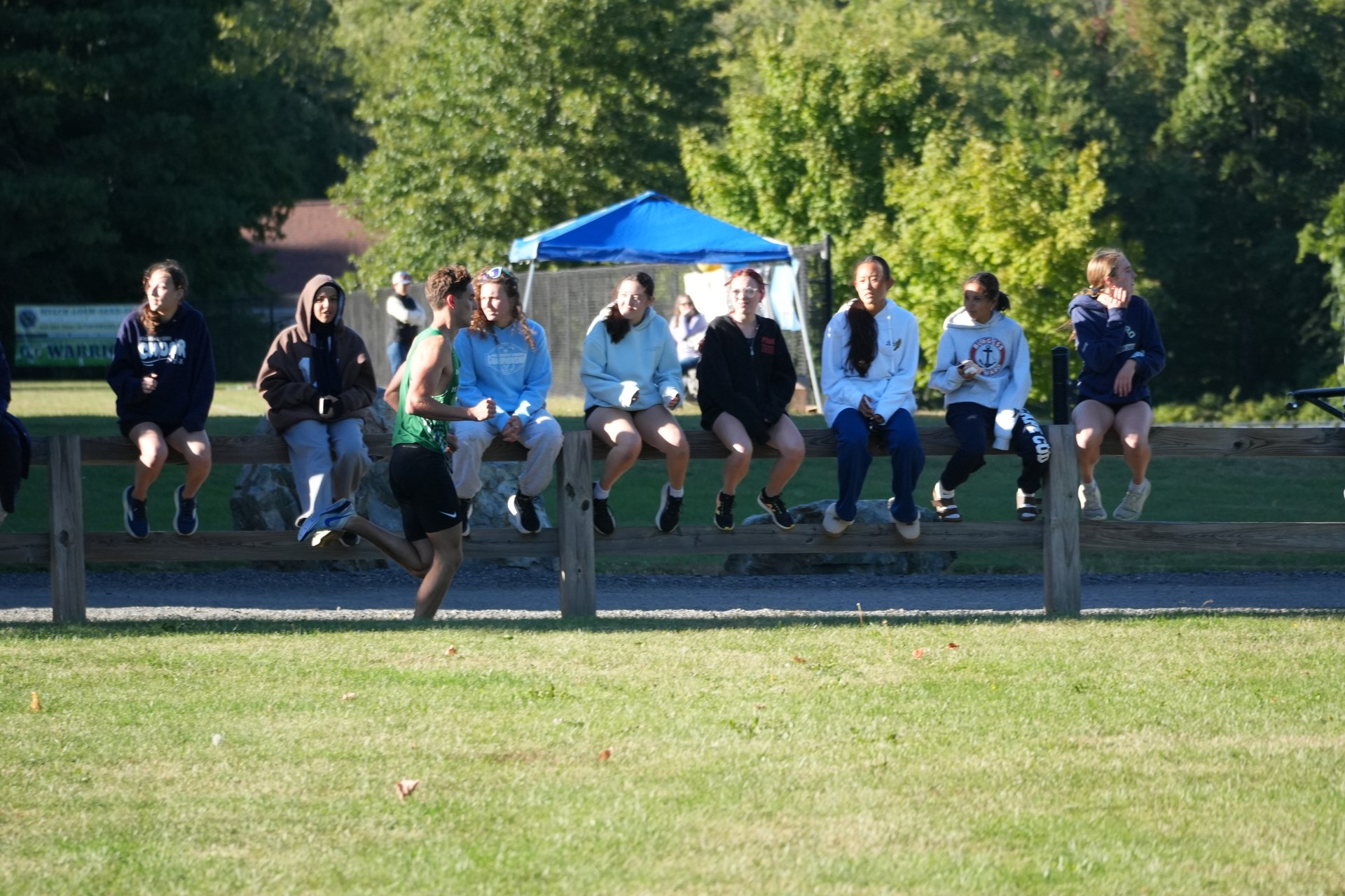 Spectators gather beside the course.