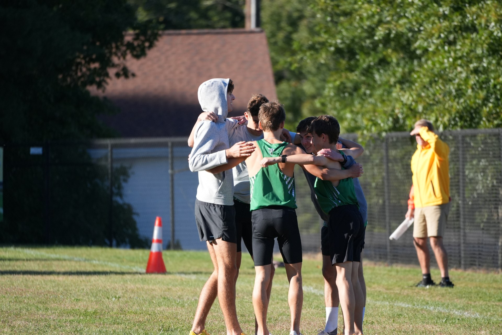 The boys gather for their pre-race huddle.